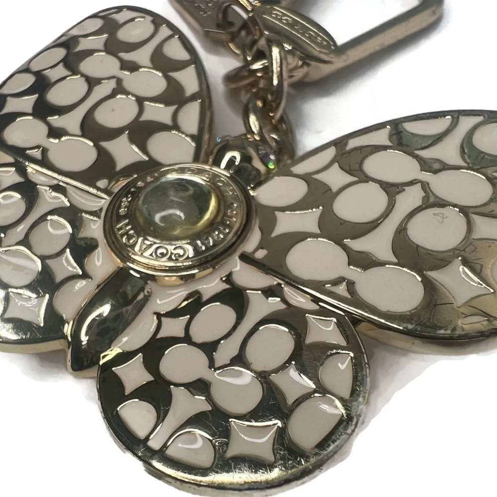 Coach Butterfly White and Gold Enamel Metal Keychain Fob Charm Rare